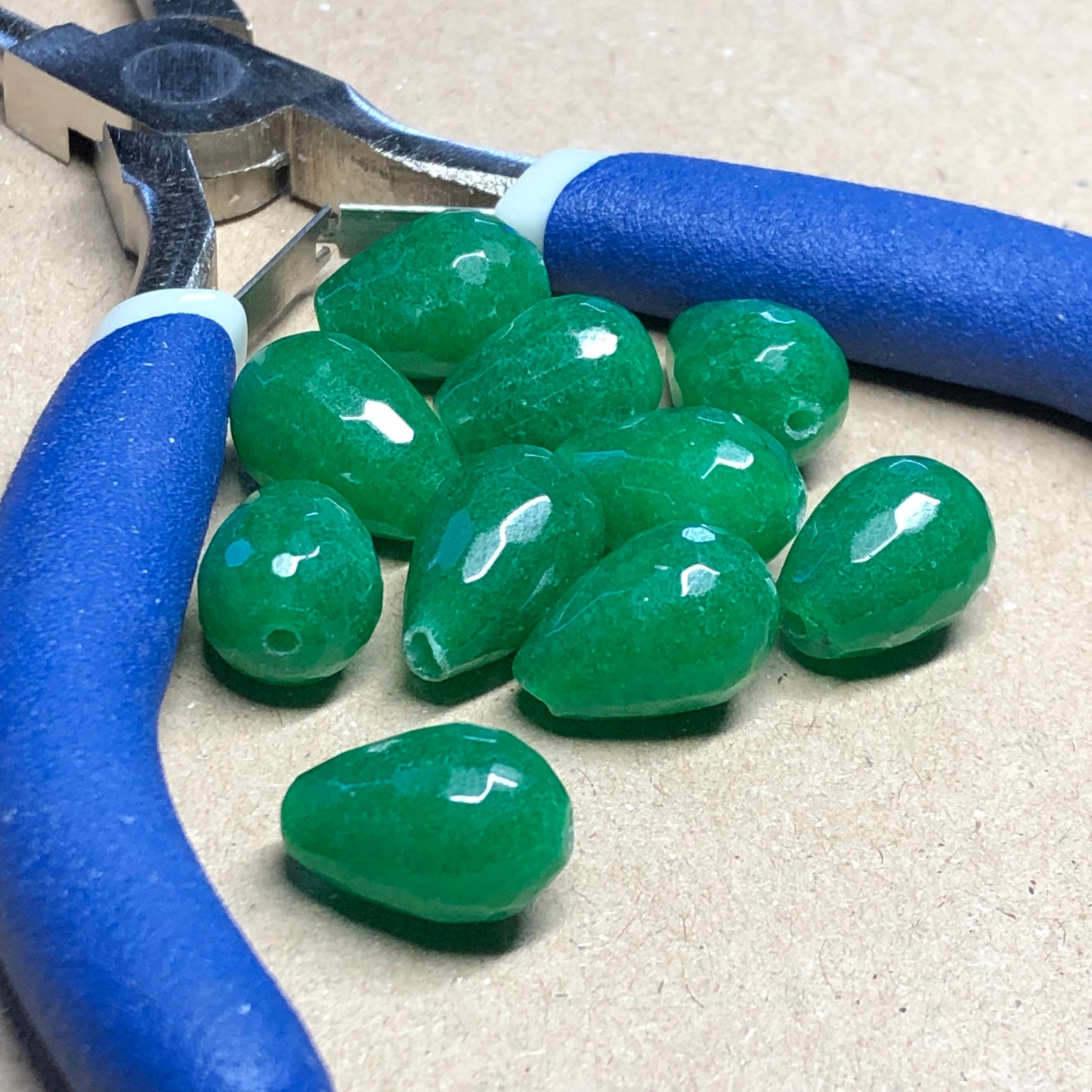 Deep green faceted teardrop glass beads