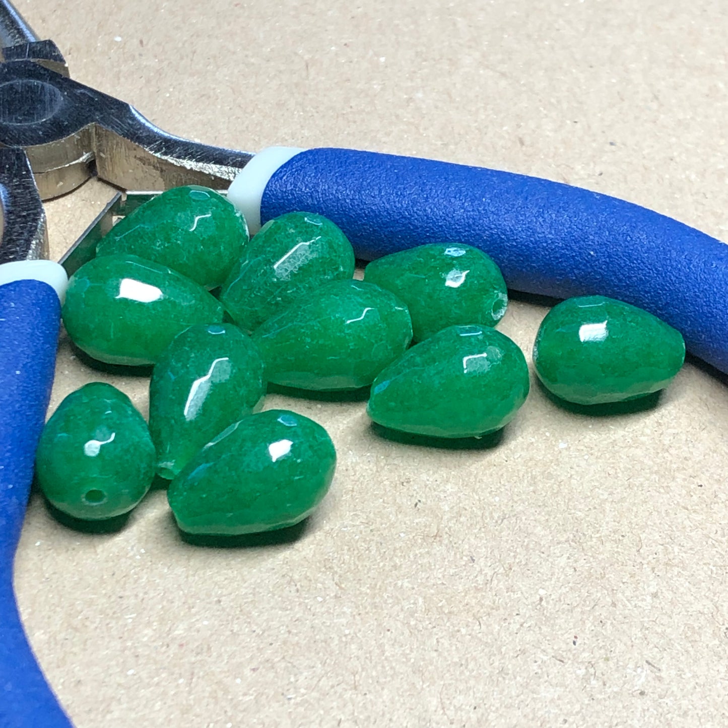 Deep green faceted teardrop glass beads