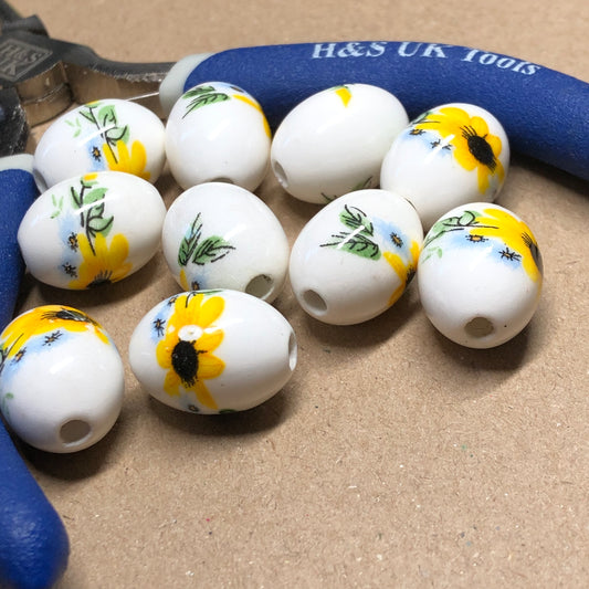 Sunflower printed ceramic oval beads