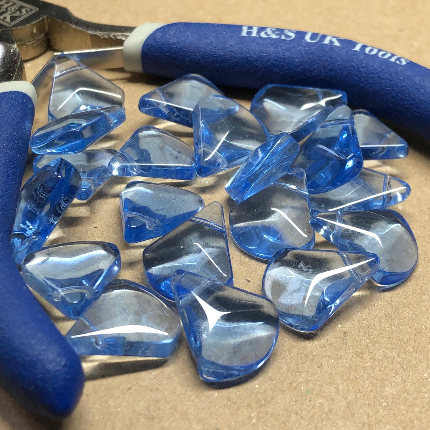 Blue round edge fan glass beads