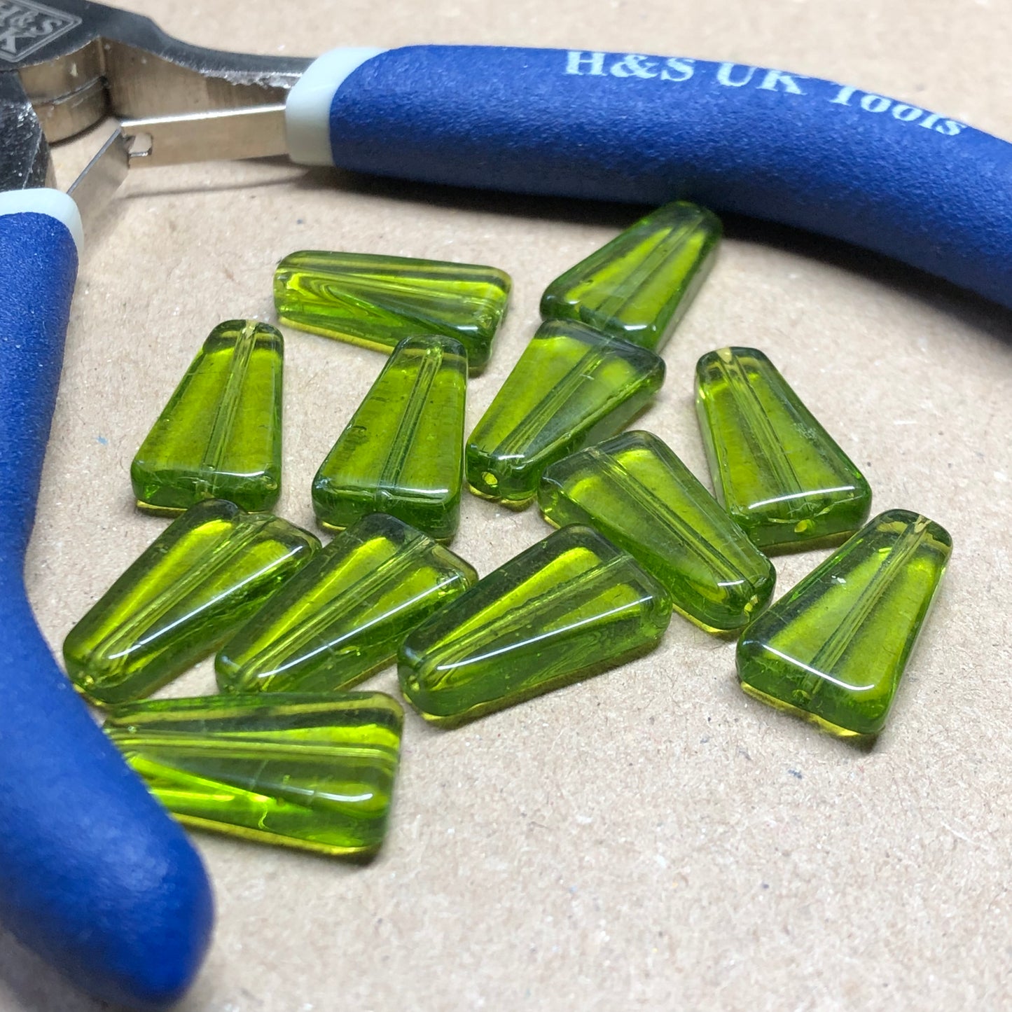 Green rhomboid glass beads