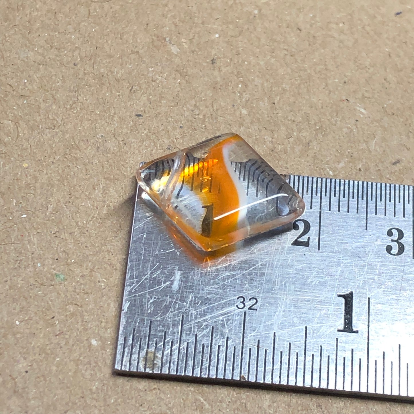 Orange diamond shaped glass beads