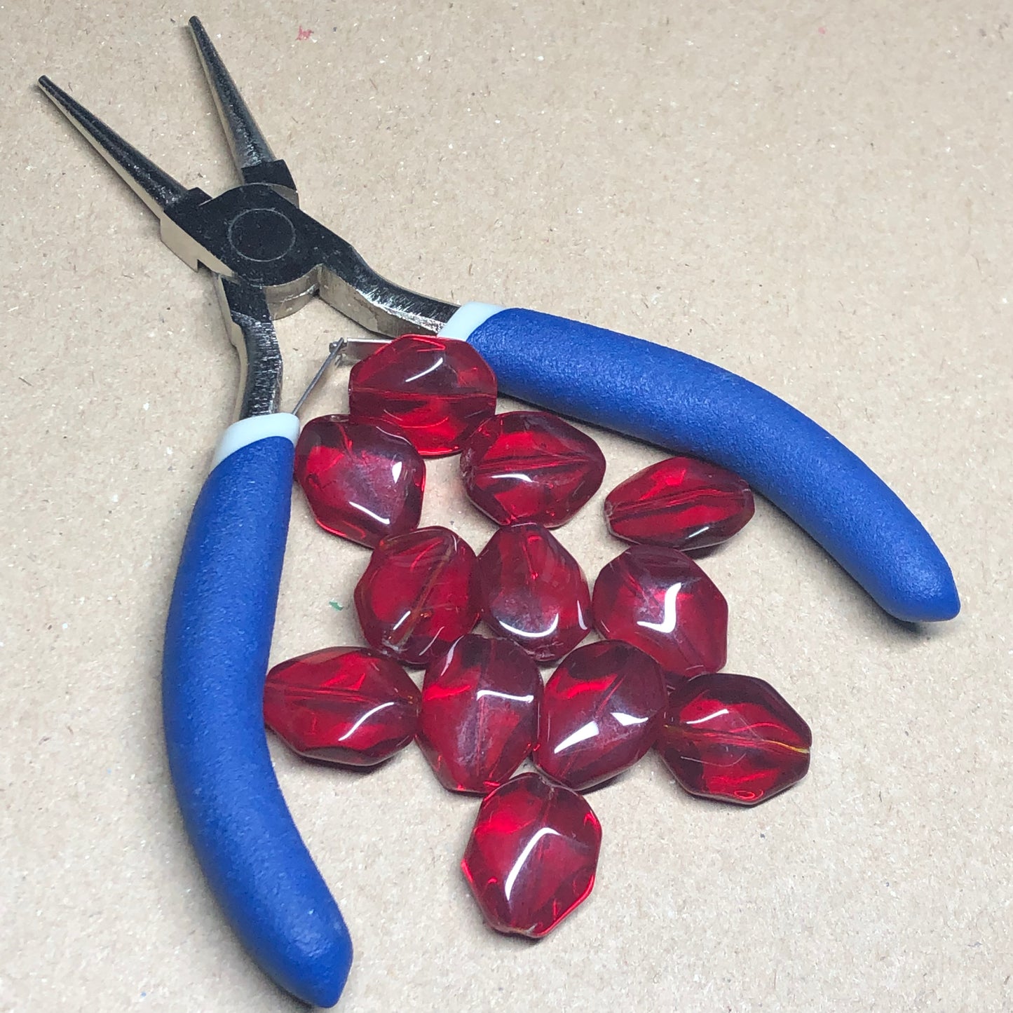 Deep red faceted octagonal glass beads