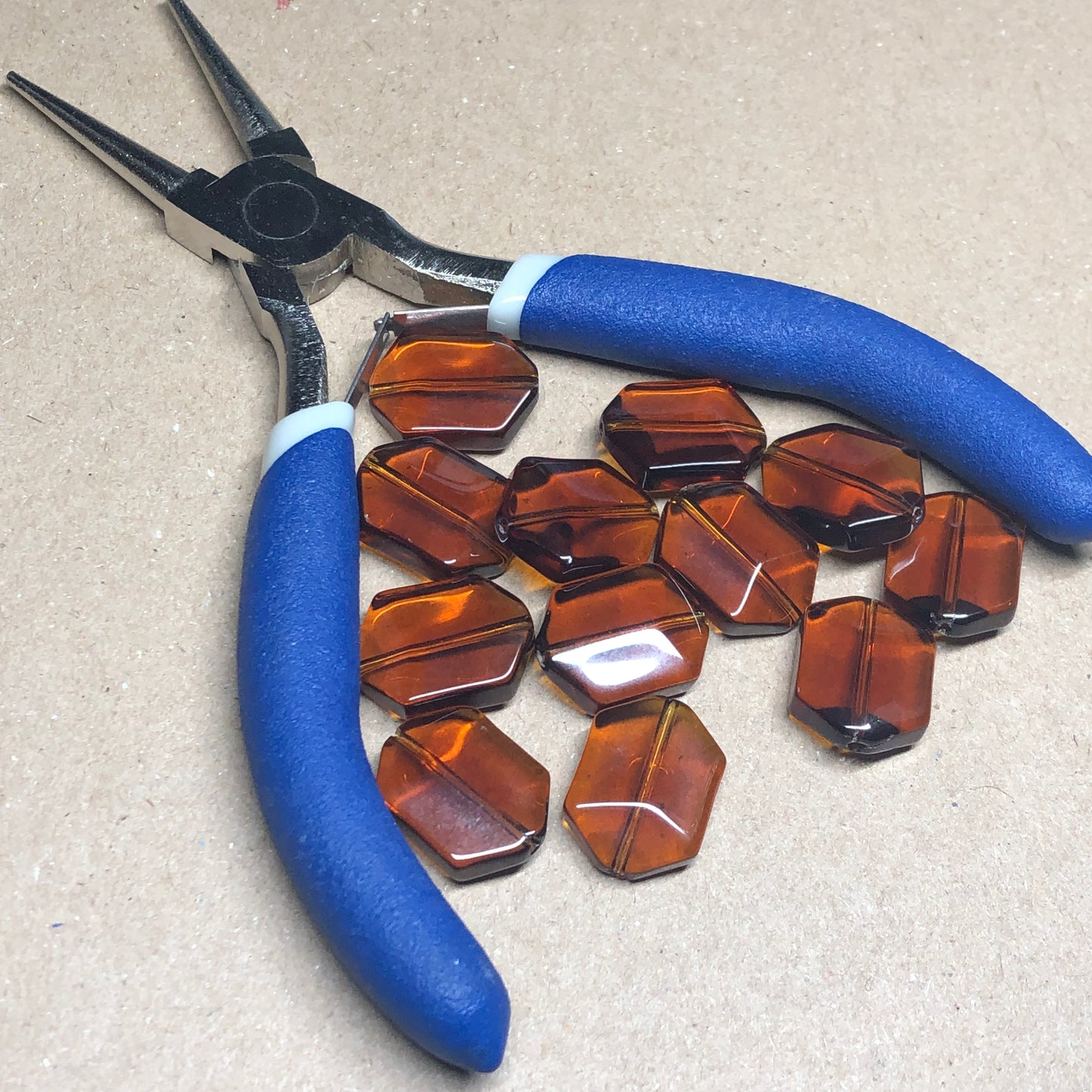 Brown faceted hexagonal glass beads